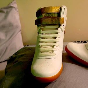 White and gold Reebok shoes with heel